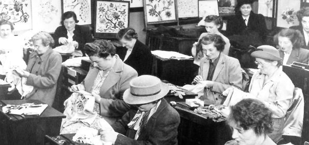 An old photo of learners in an embroidery class
