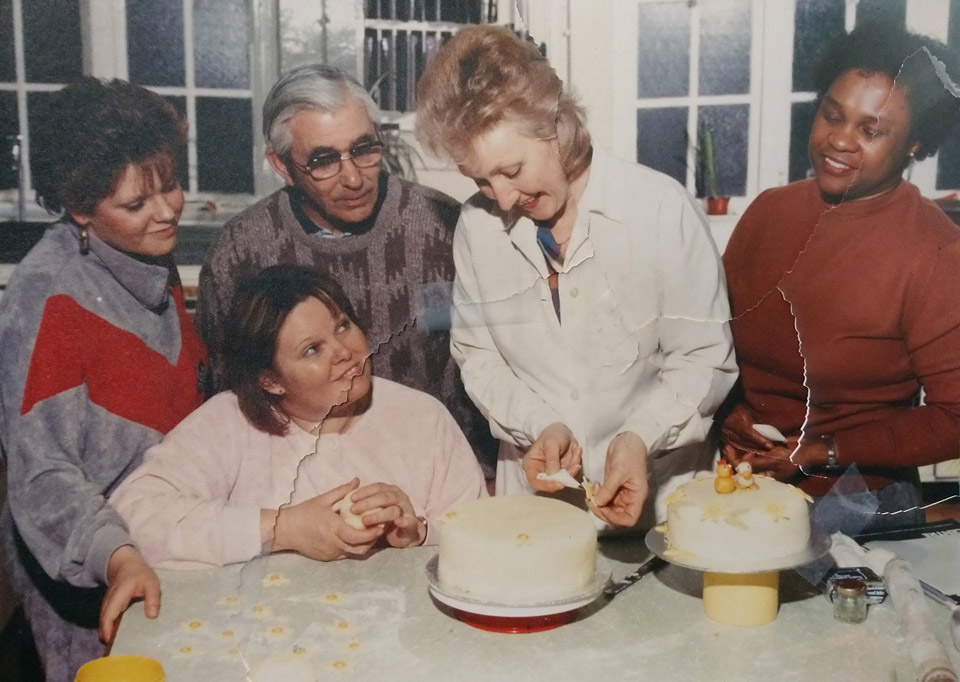Photo from the 1980s of learners in a cake decorating class