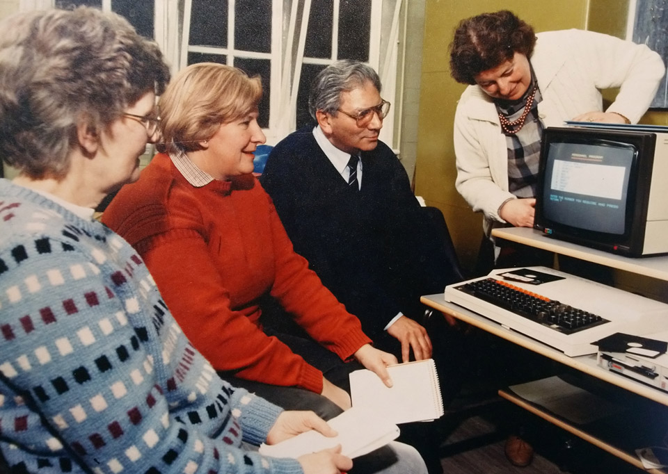 Photo from the 1980s of learners in a computer class