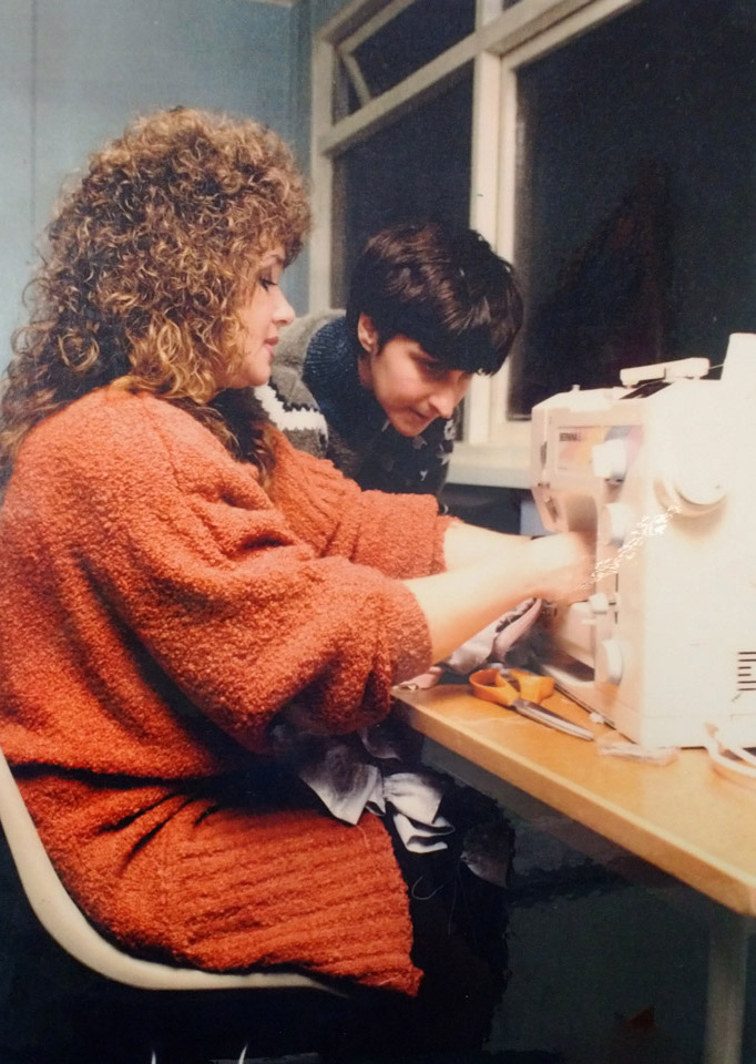 Photo from the 1990s of learners in a sewing class