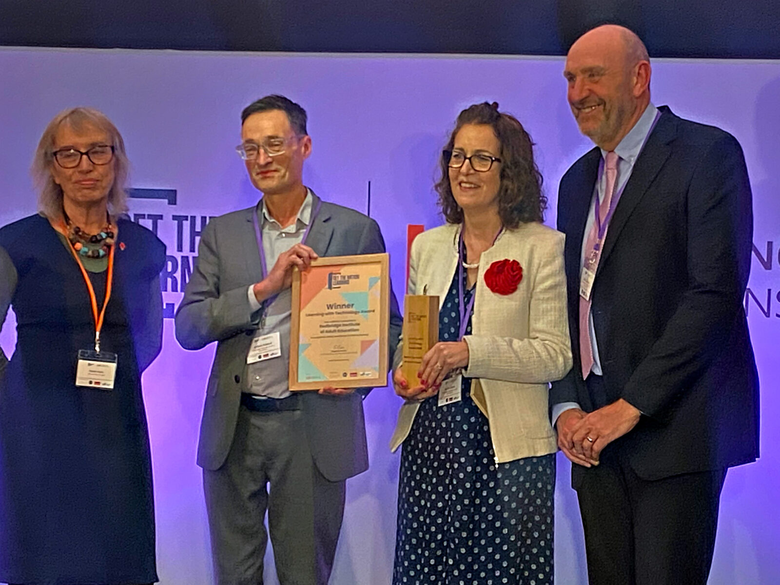 Team collecting their award